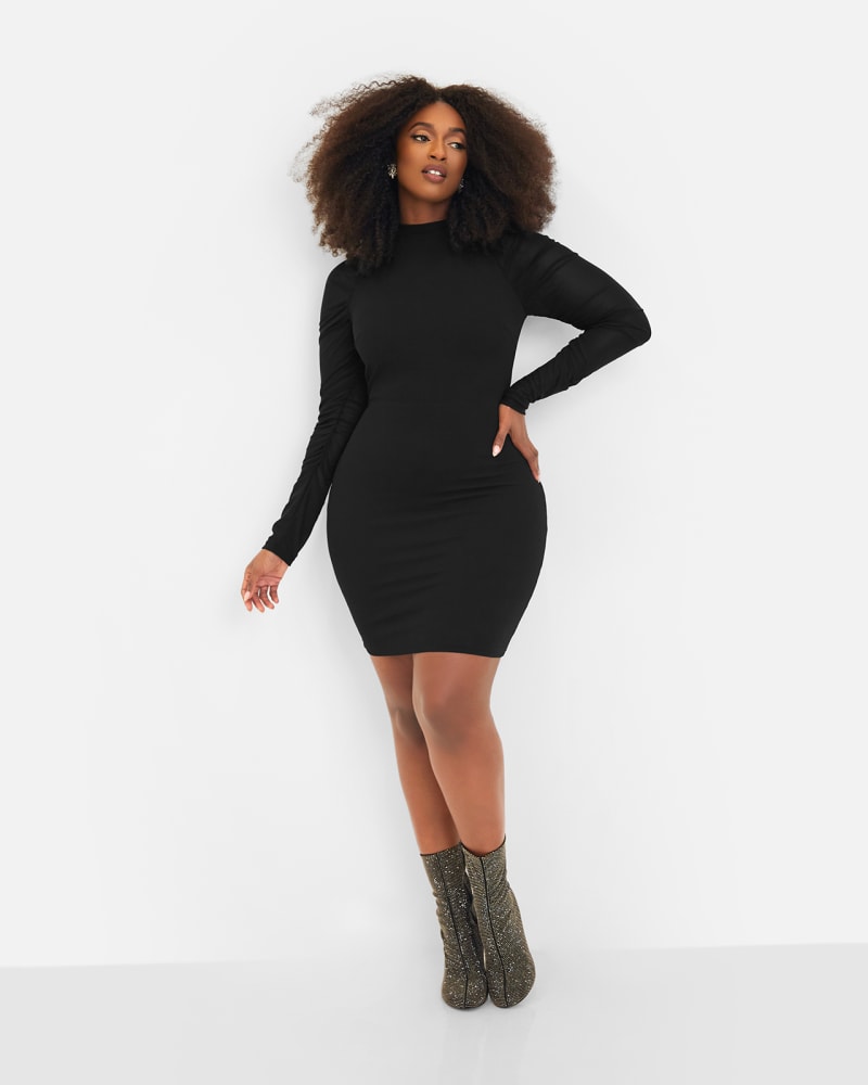 Front of a model wearing a size 5X Believe Me Mesh Long Sleeve Mini Bodycon Dress in Black by Rebdolls. | dia_product_style_image_id:328555